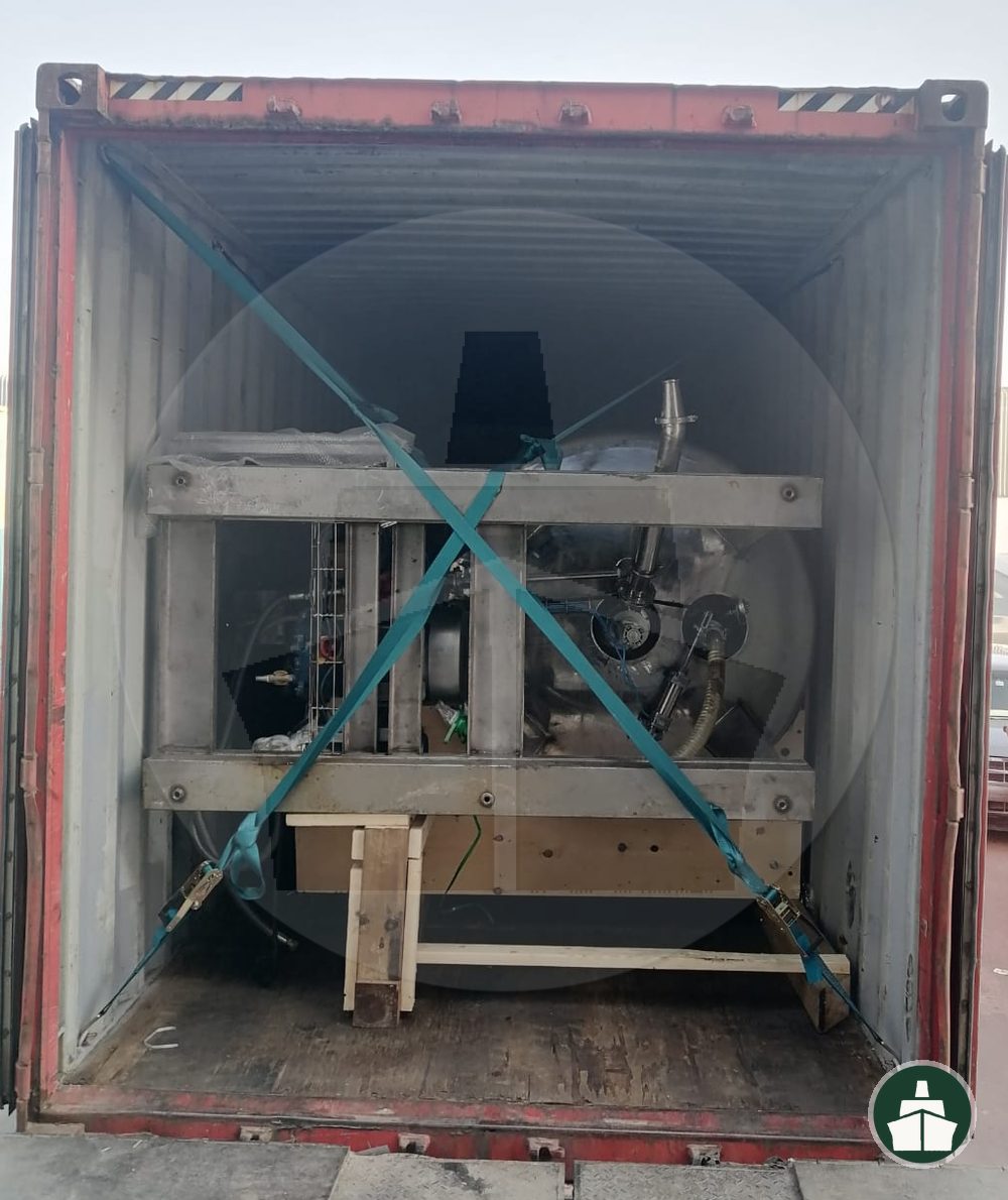 Crated oil and gas equipment braced and lashed inside a container at Jebel Ali
