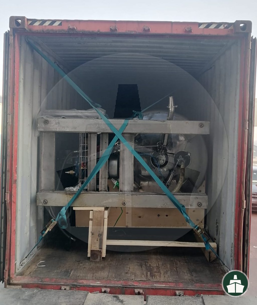 Crated oil and gas equipment braced and lashed inside a container at Jebel Ali