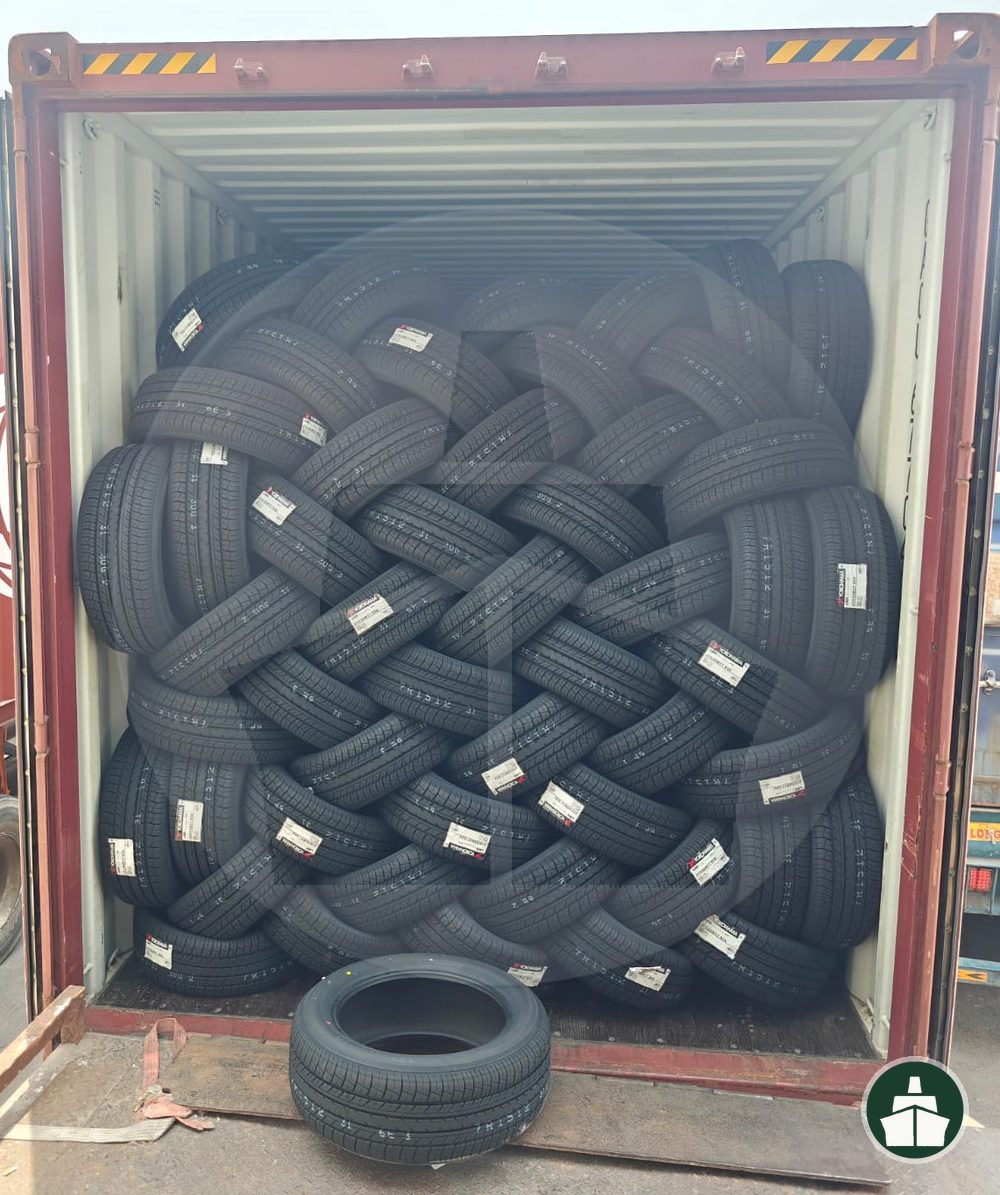 Tyres stacked in rows inside a container during cross stuffing at Jebel Ali